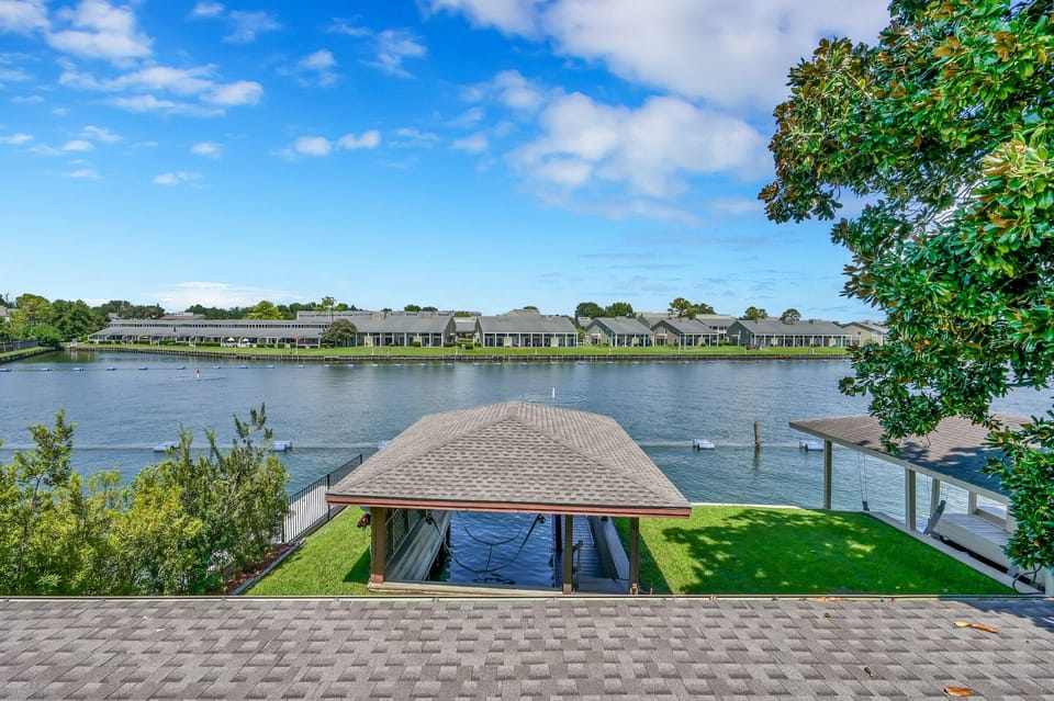 View of lake and boathouse from second level balcony