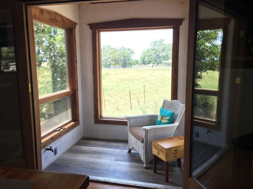 Updated nook for reading, bird watching, or just watching the clouds go by.