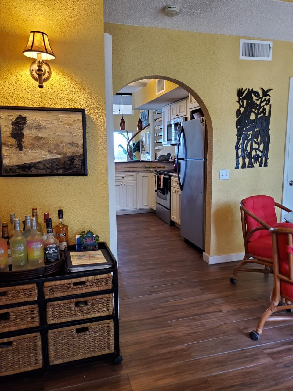 Entry with dining to right and kitchen beyond.
