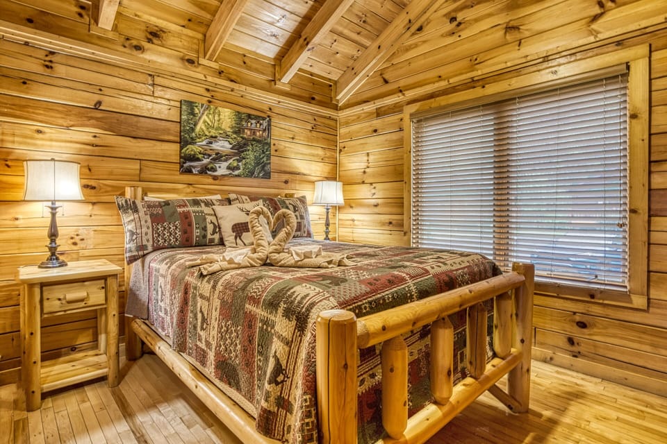 Pigeon Forge Cabin "Down by the River" - Bedroom with queen size bed