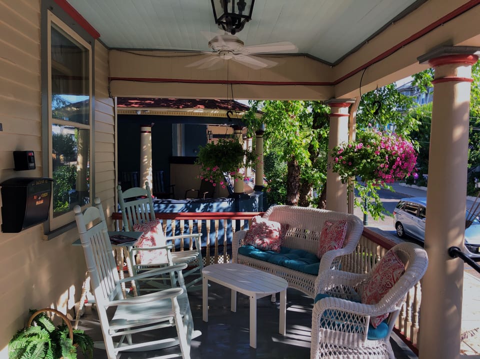 Relax on the large front porch overlooking historic Jackson Street