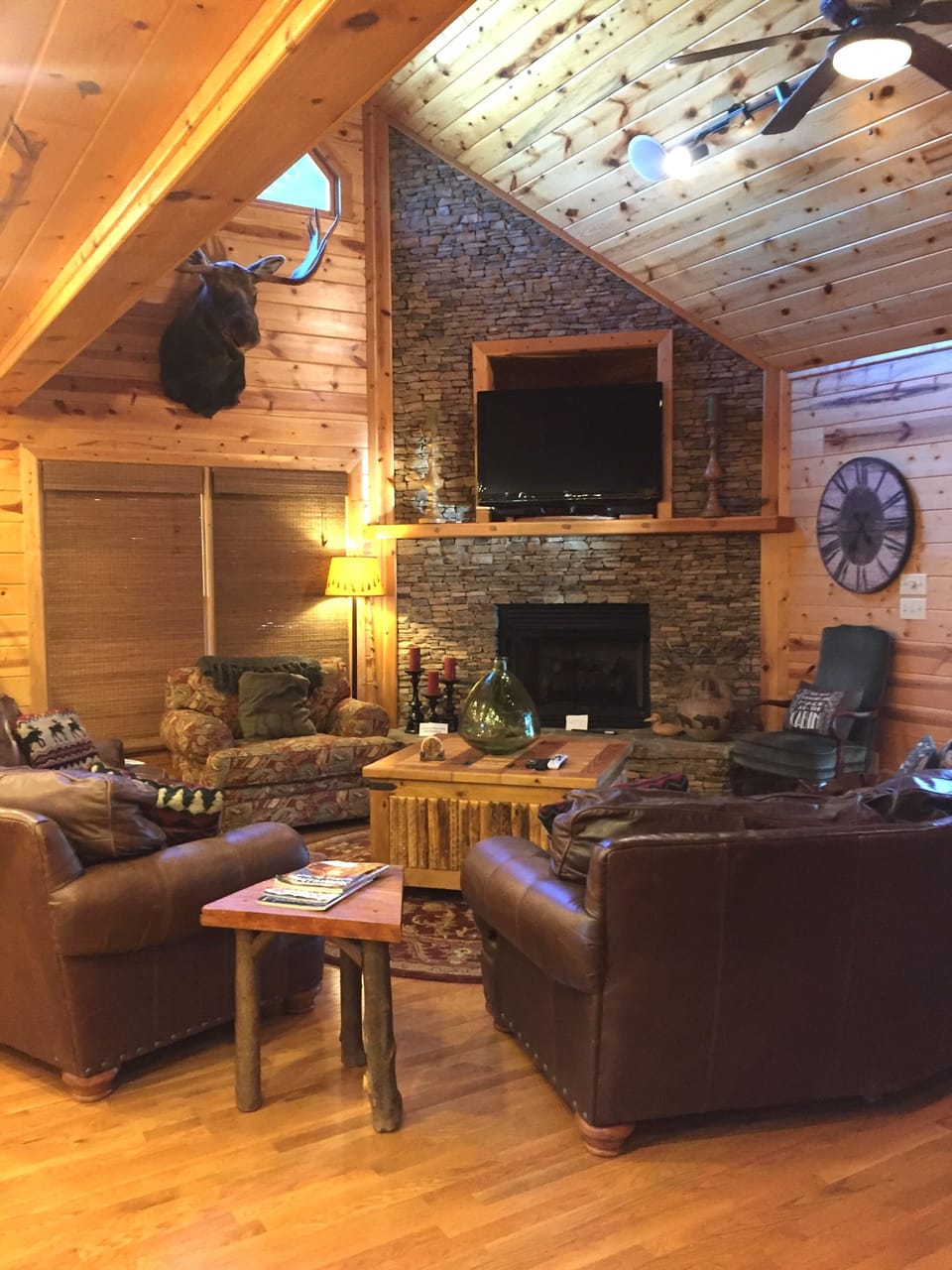 Spacious den with large TV.