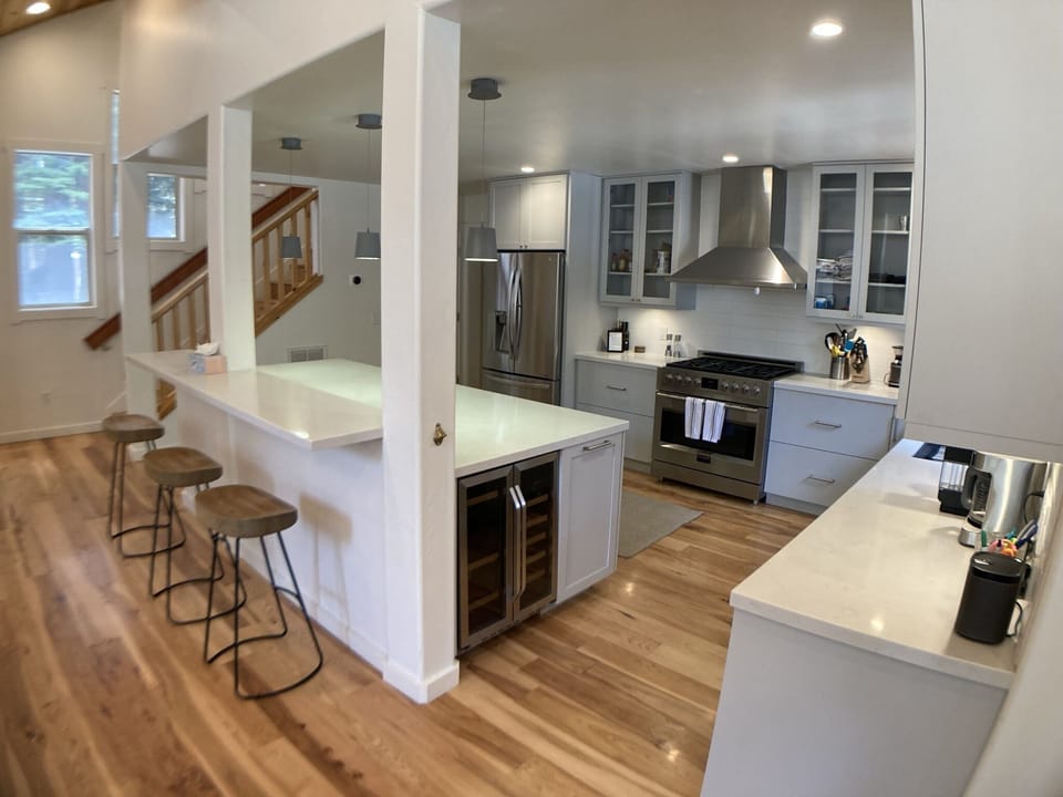 Beautiful chef's kitchen with enormous island and kitchen prep area
