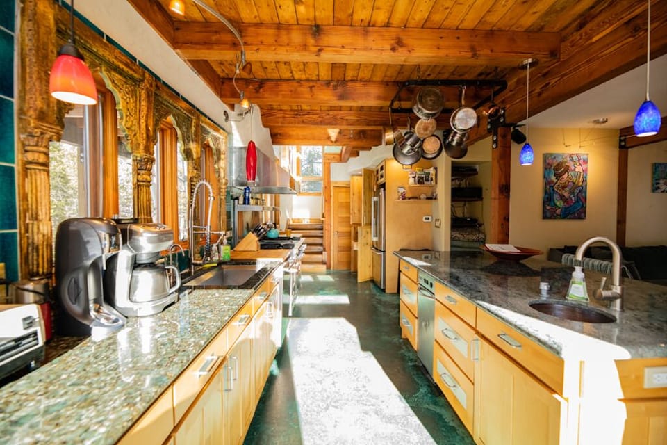 kitchen with Indian window frame, granite counters
