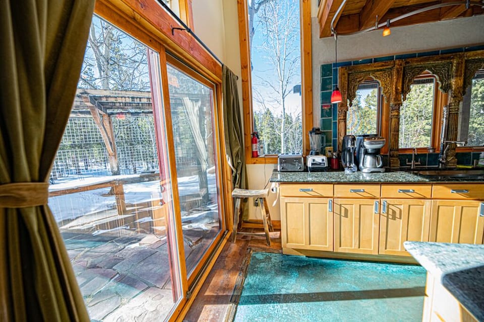 Kitchen views. Large windows and doors provide plenty of natural light