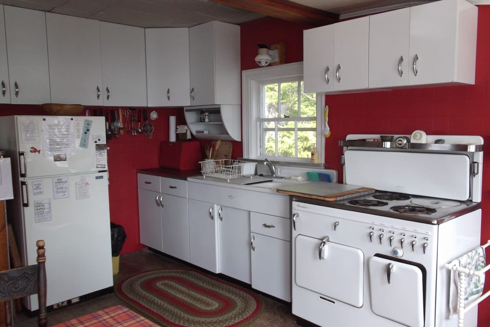 The kitchen has non-electric cooking gear plus an electric coffee bean grinder.