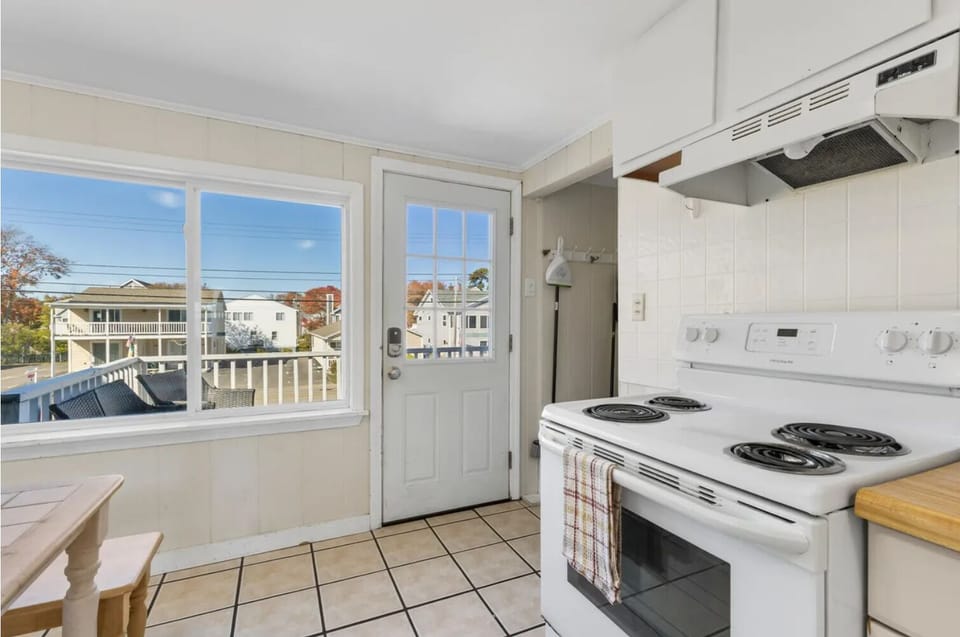 Fully equipped kitchen with full size oven/stove, dishwasher, and refrigerator.