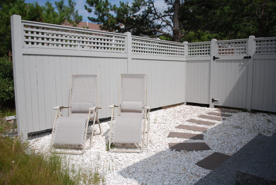 Outdoor seating adjacent to master bedroom.