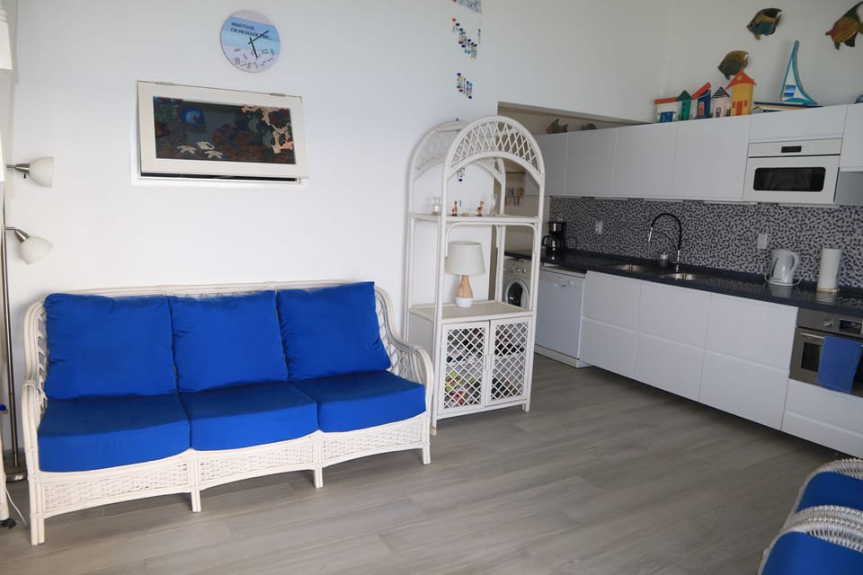 Living Room/Kitchen.  Air conditioner available at extra cost.