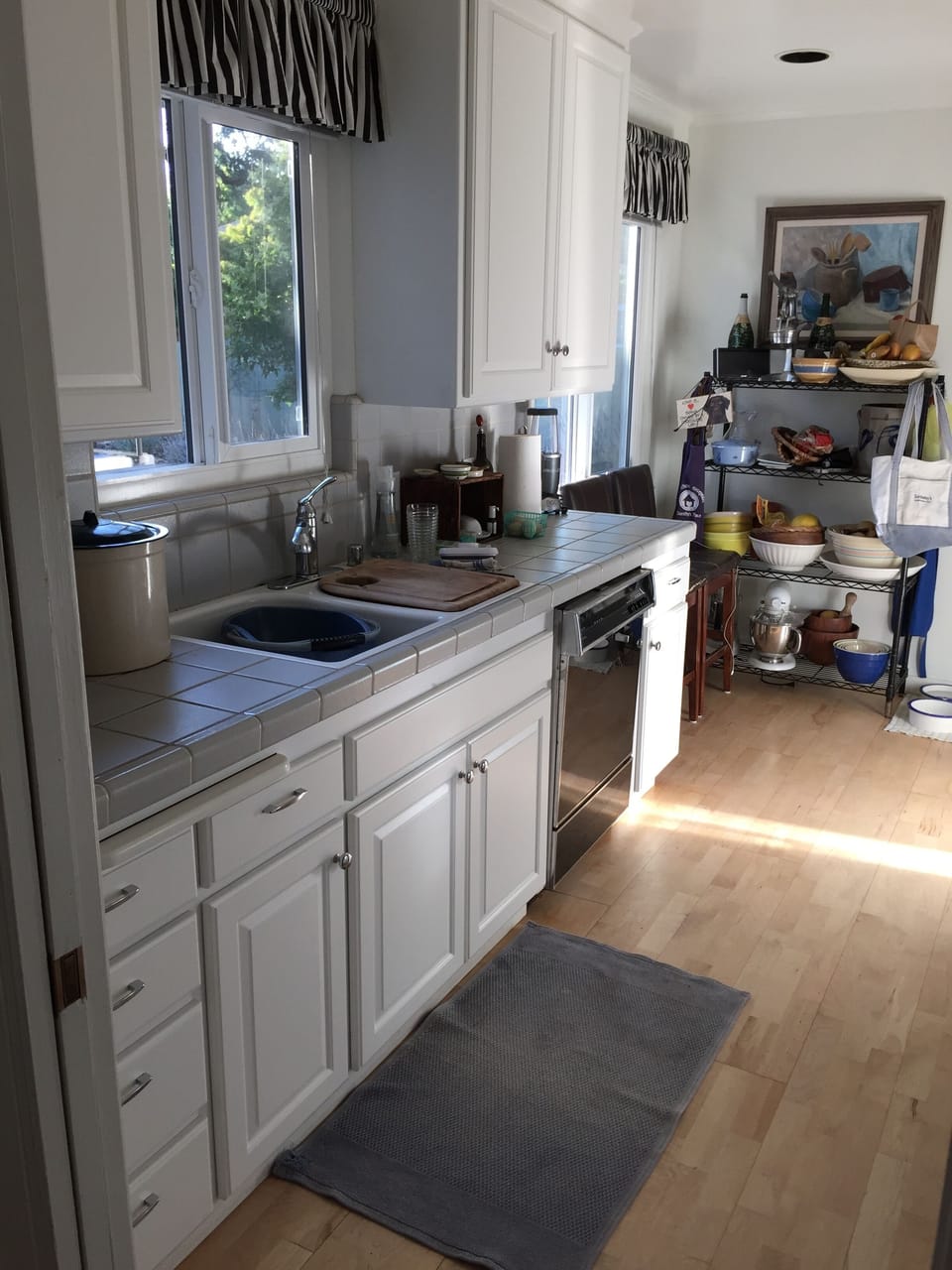 Comfortable kitchen with windows looking West and all the cooking amentities.