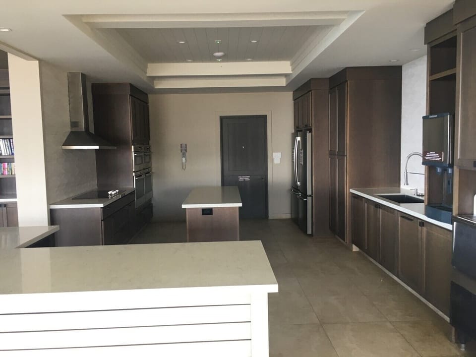 Pavilion Kitchen - 2 refrigerators/microwaves/ovens, stove top, sink, ice maker.