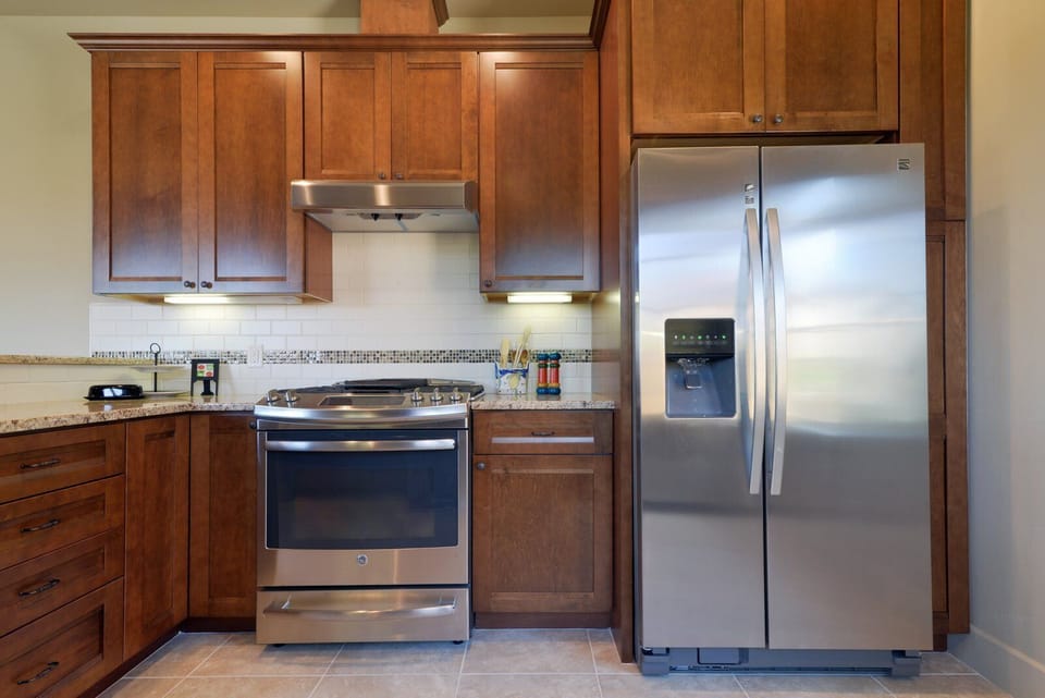 The kitchen includes nice high end appliances.