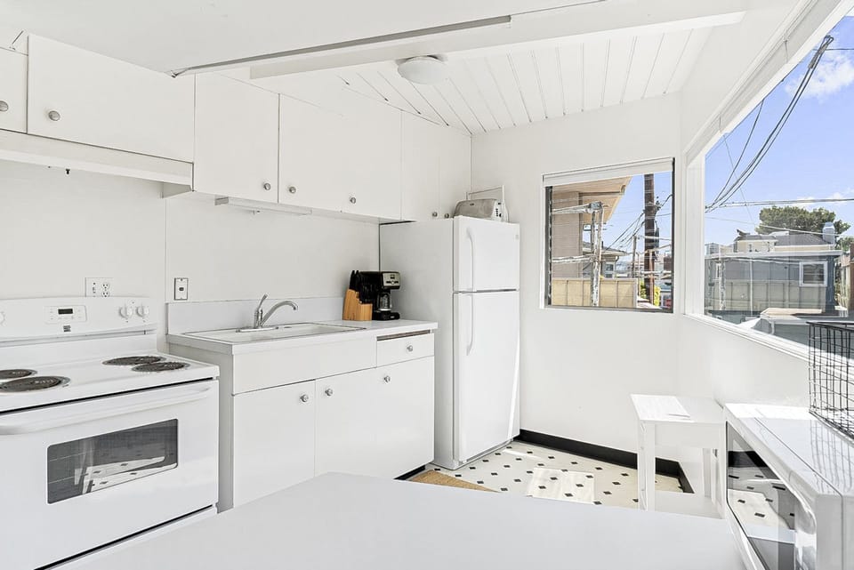 The kitchen comes stocked w/ cookware, dinnerware, utensils, and appliances for meal preparation (but no dishwasher)
                