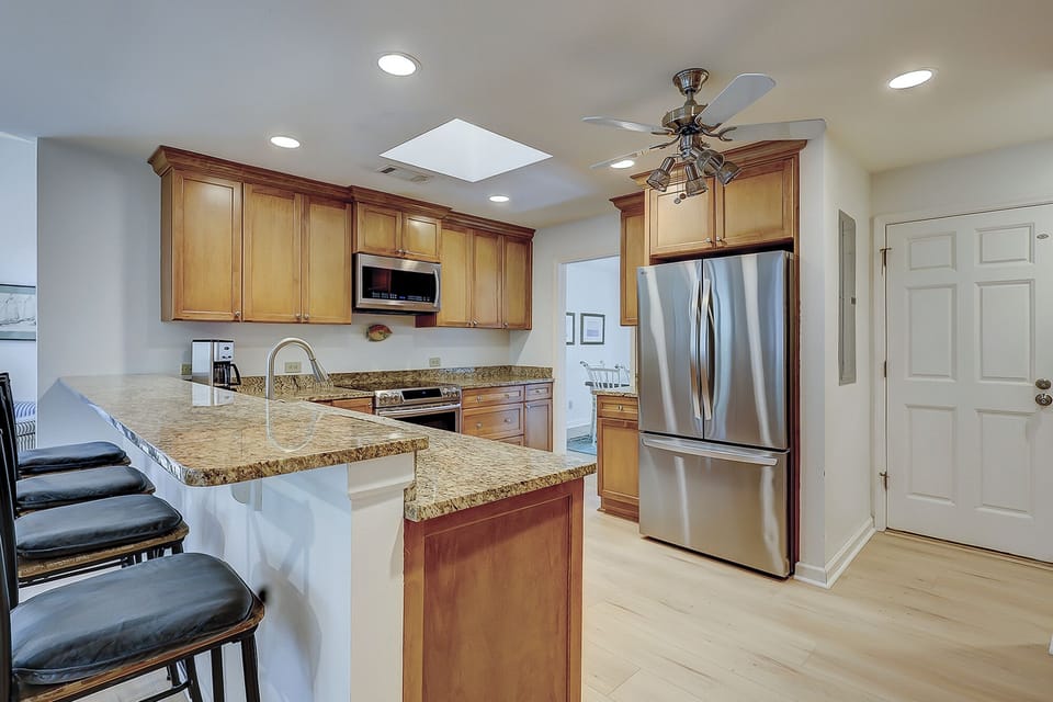 Kitchen between family room and dining room
