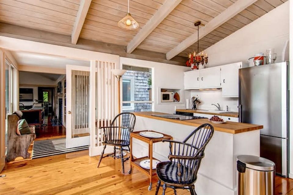 Kitchen and sitting area overlook the pool
