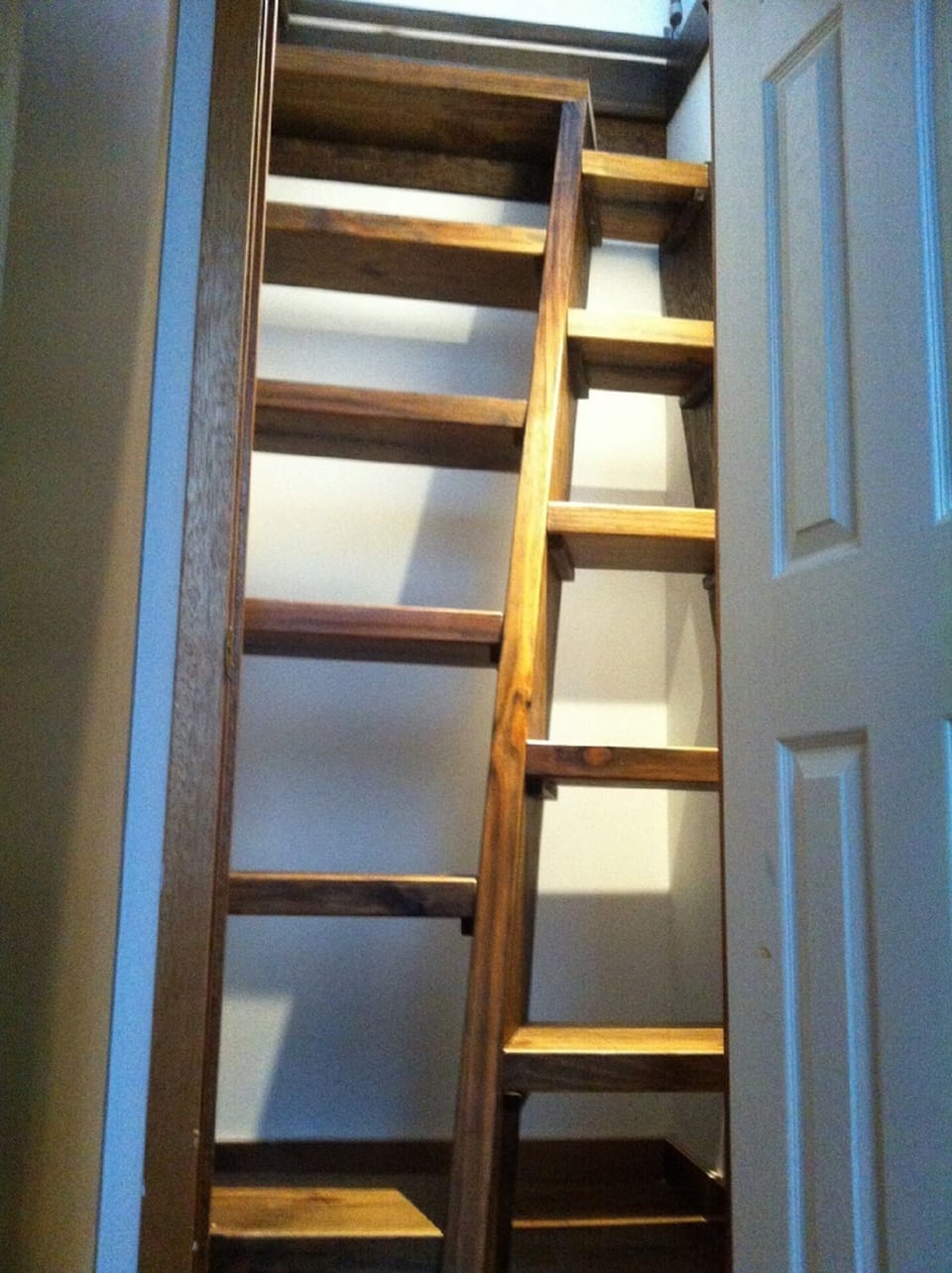Japanese ladder to attic bedroom.