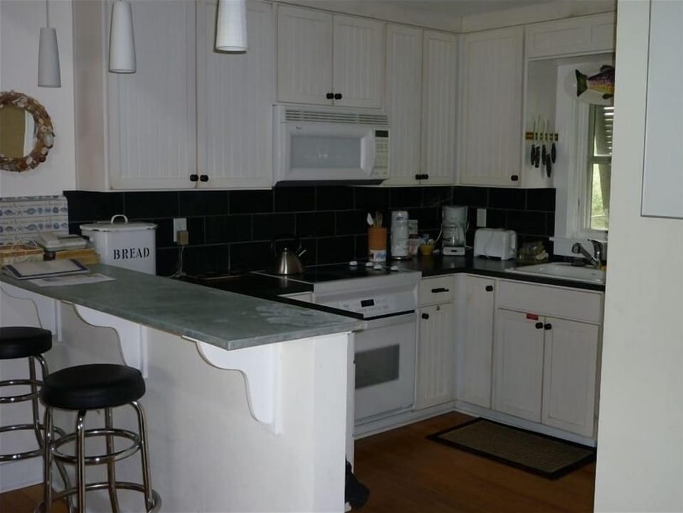 Kitchen with zinc counter top.