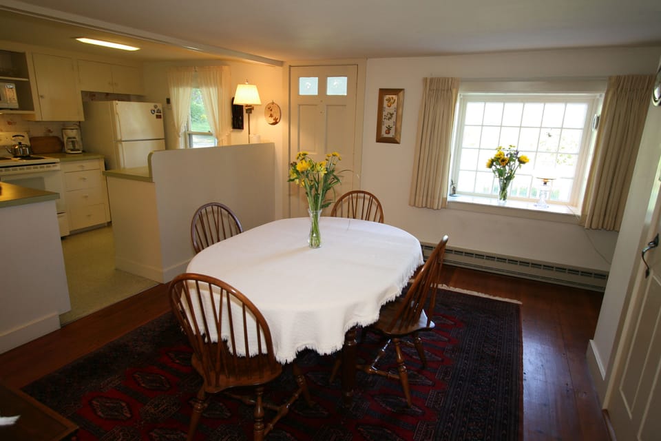 The dining area adjoins the open kitchen