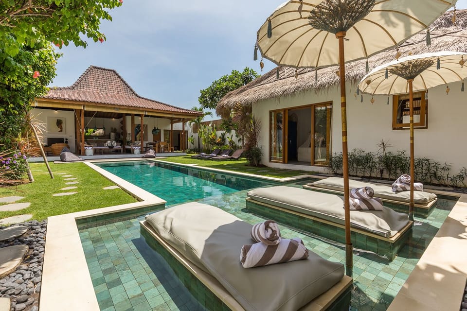 immersed sunbeds in the pool