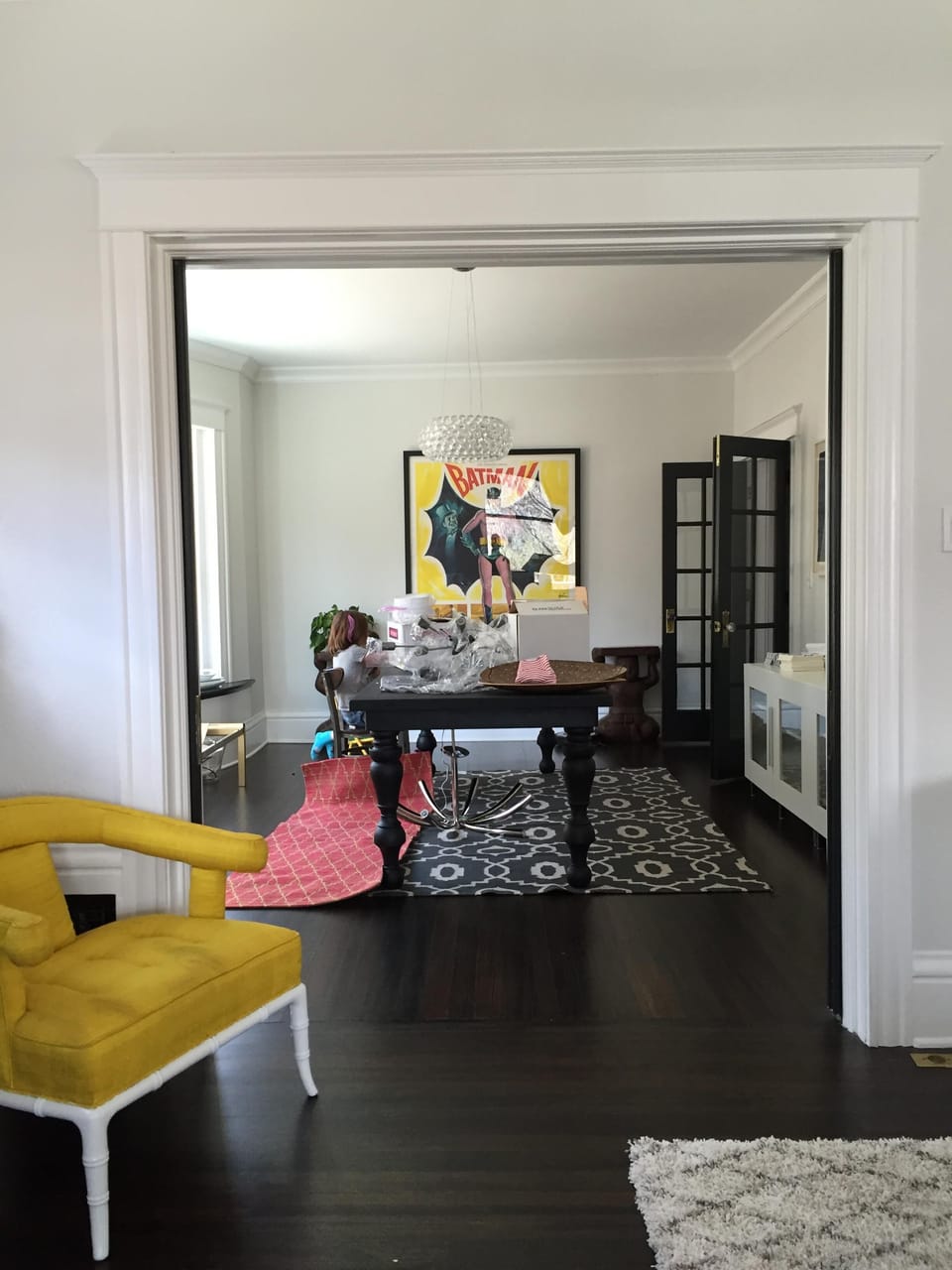 Living room with french doors opeing into dining room