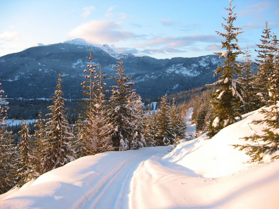Cross country skiing - views over the valley to Rainbow Mtn