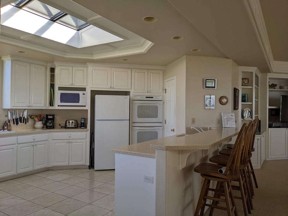 Large refrigerator, double oven and walk-in pantry.