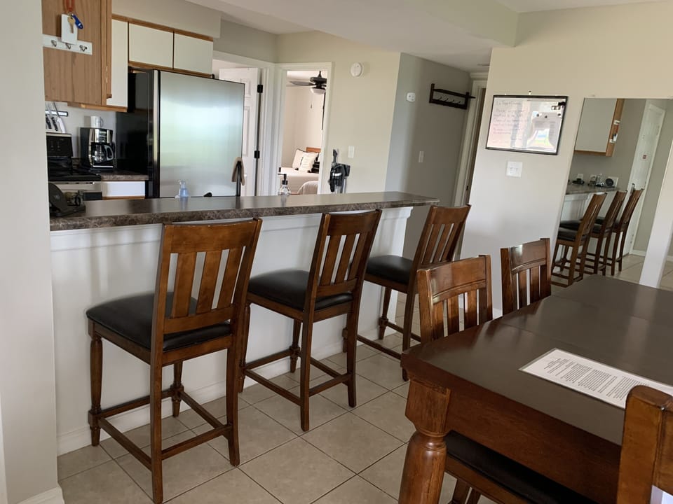 Another view of kitchen with bar seating 