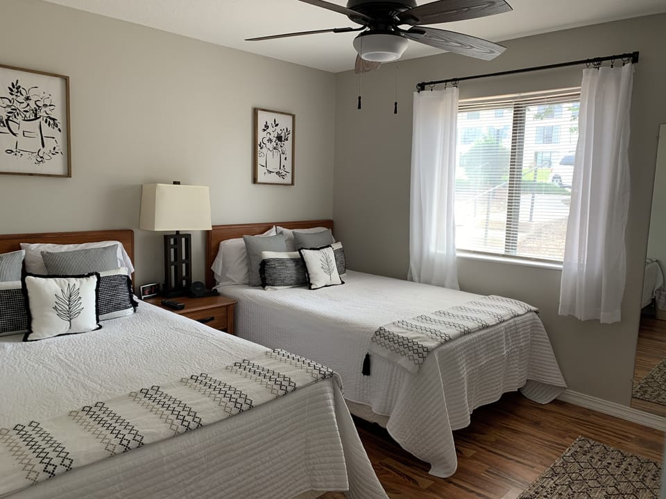 The bright and airy 3rd bedroom with 2 full size beds. 