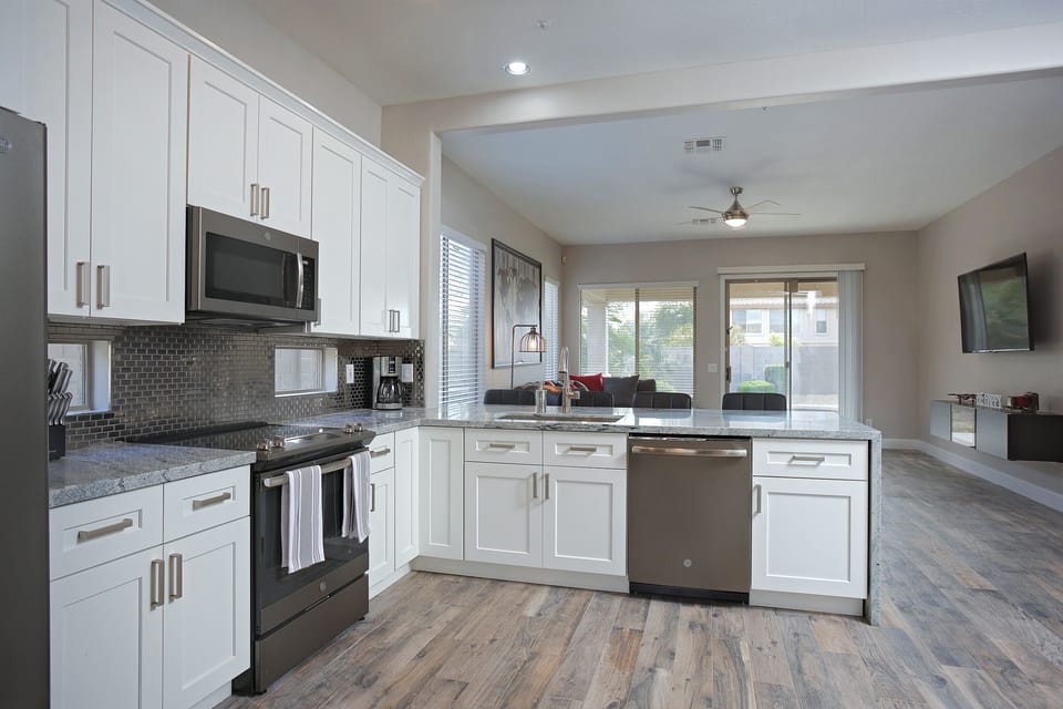 Reclaimed wood looking porcelain tile throughout