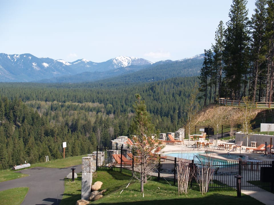 Outdoor pool and hot tub overlooking the river	