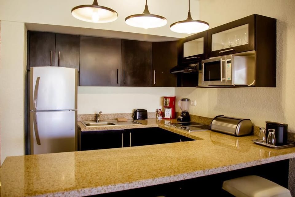 Kitchen area of suite at Casa Dorada Medano Beach