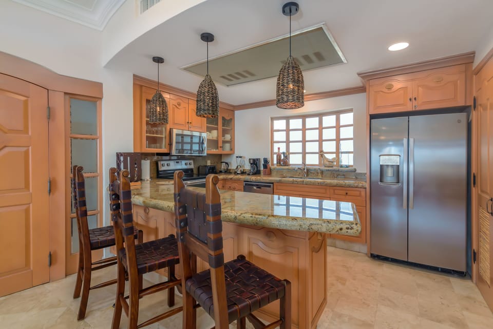 Kitchen with granite countertops and stainless steel appliances