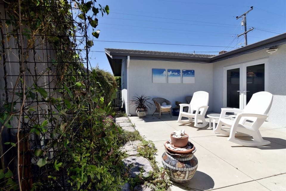 The back patio is the perfect place to hang out after a day at the beach
