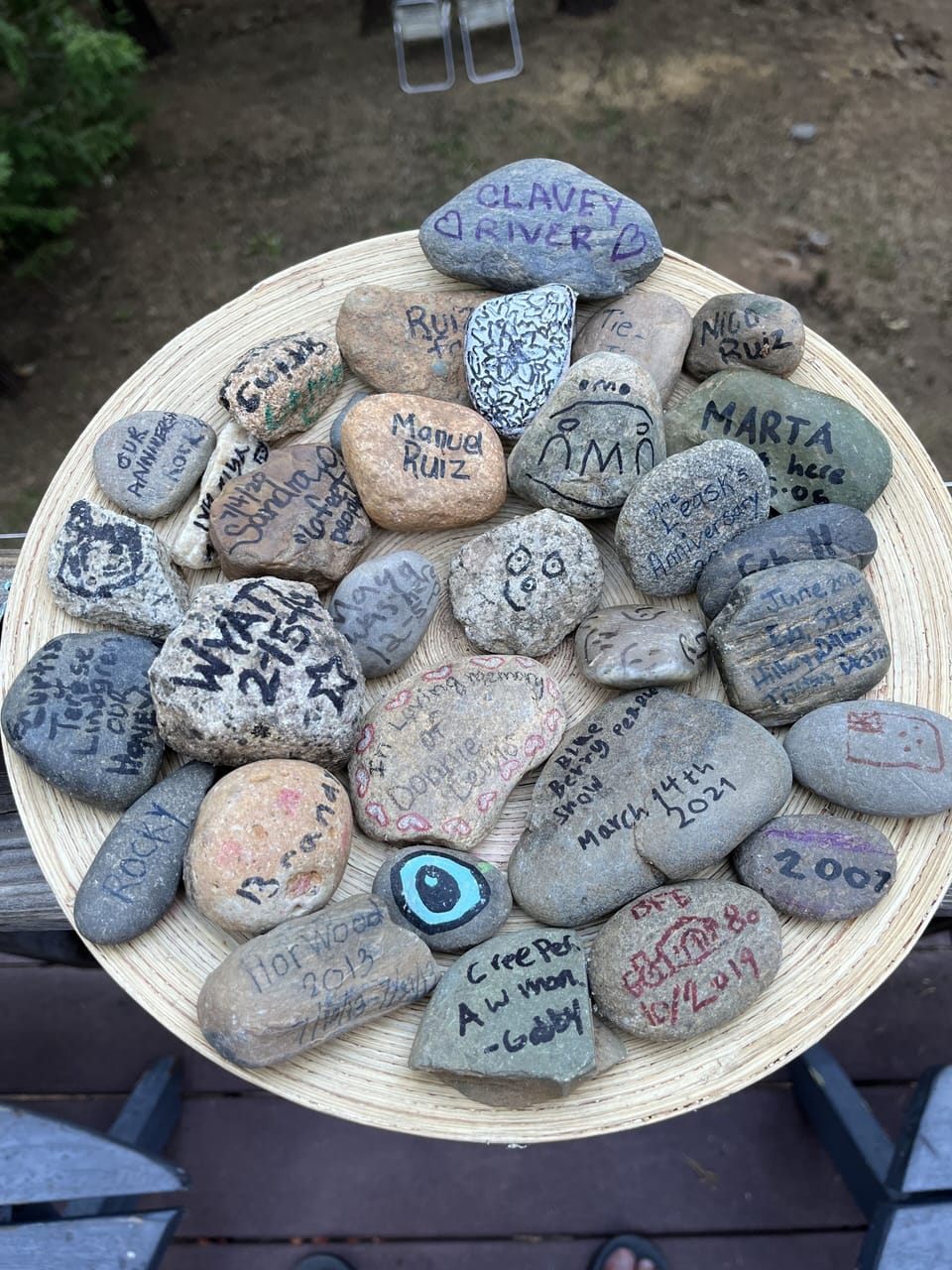 Some of the hundreds of hearthstones left by many guests over the years.  