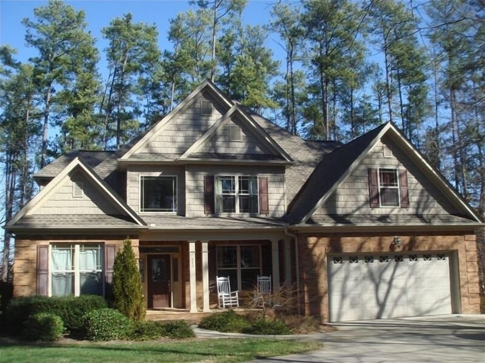 Paved driveway and entry at a Clemson football rental with ample parking.