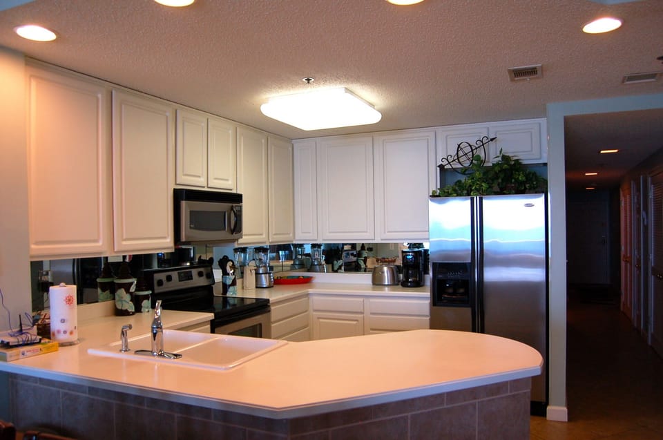 Fully equipped kitchen with new stainless appliances