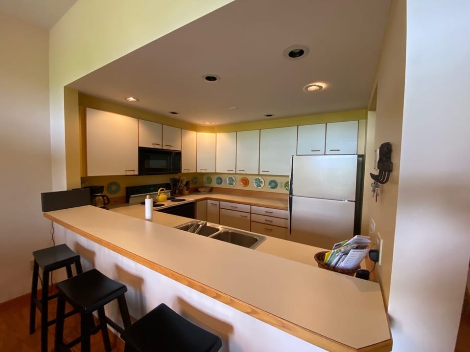 Breakfast Bar Opens onto the Kitchen