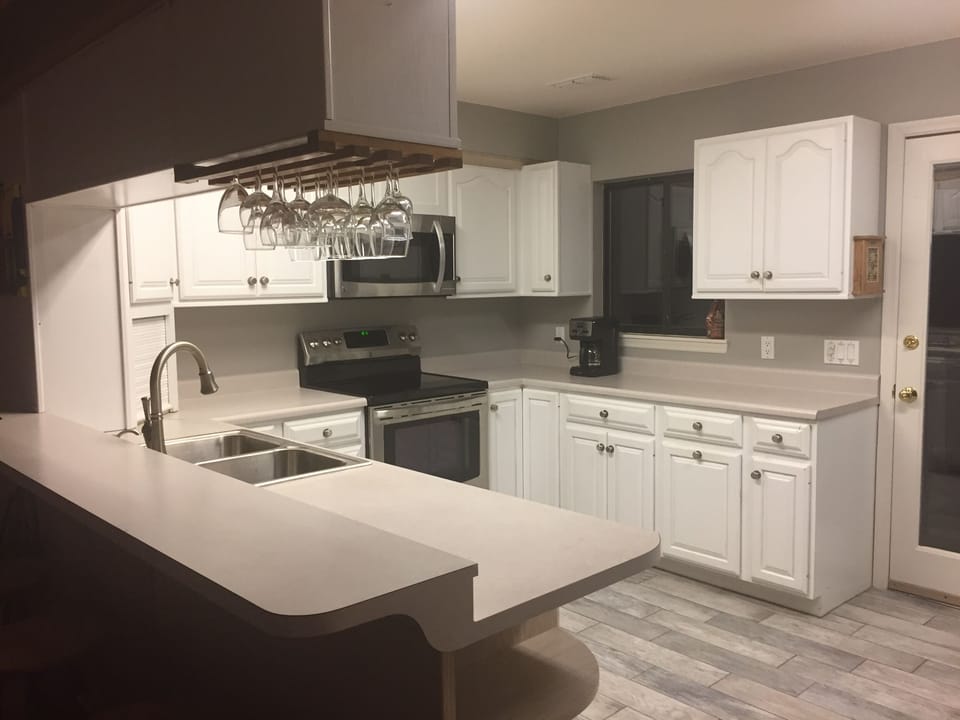 Our newly painted upstairs kitchen with all new appliances! Lotsa counter space!