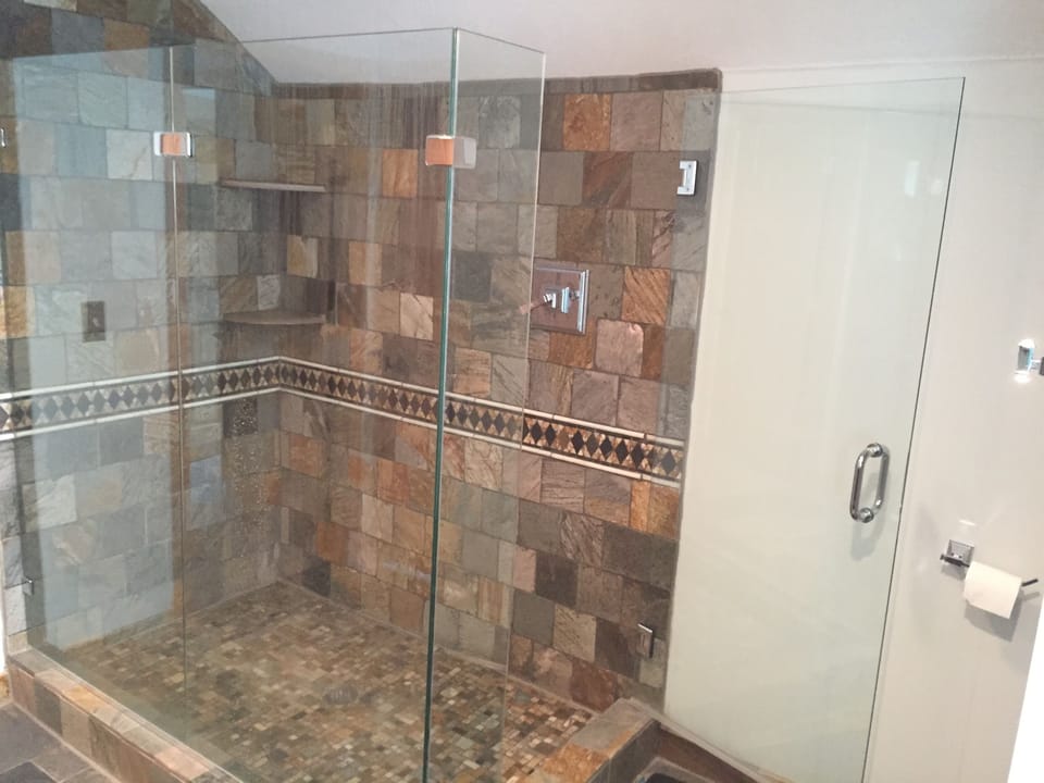 Bathroom 2 - Upstairs Master tiled Travertine shower