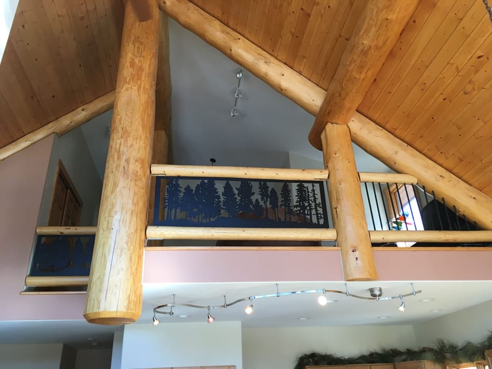 Suspended Loft-wrought iron pine tree railing