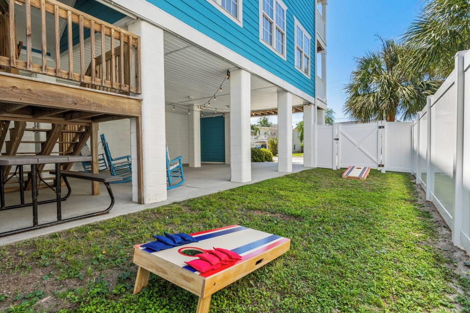 Hang outside and play a game of corn hole.
