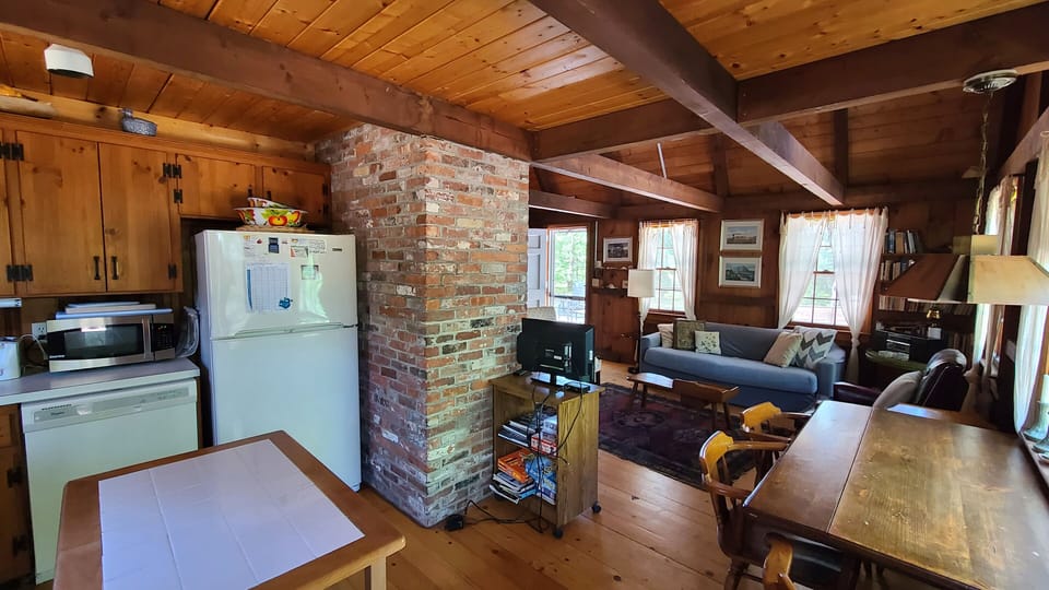 Dining area between kitchen and living room