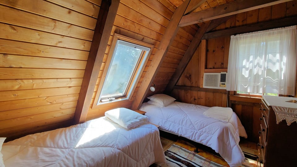 Second floor bedroom with two twins