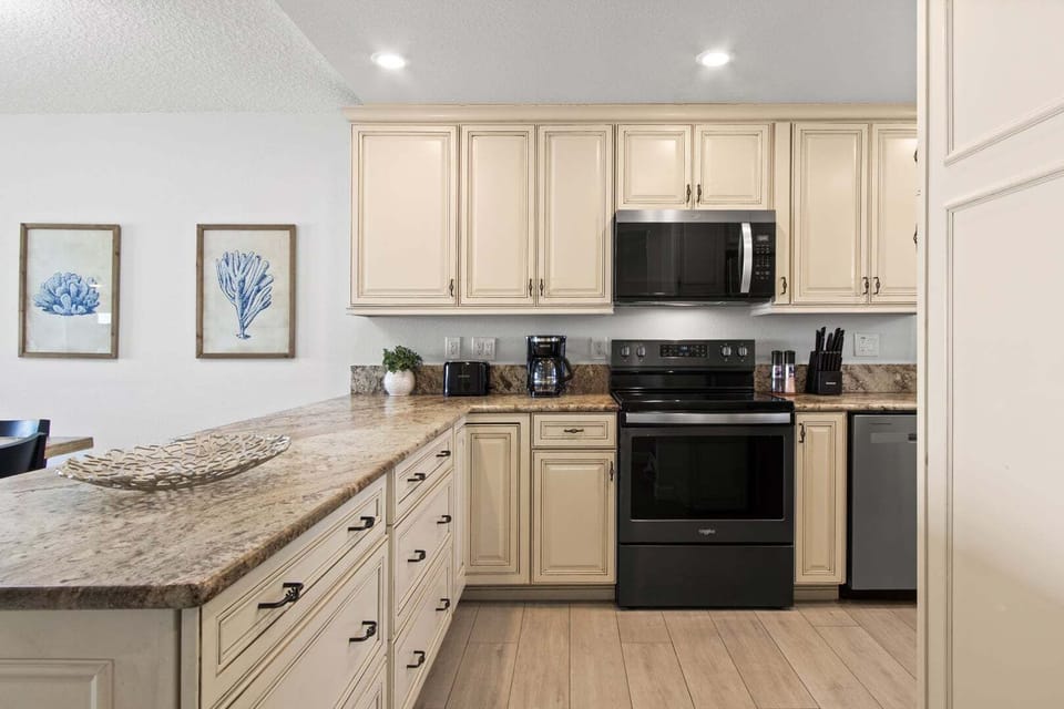 A fully equipped kitchen with modern appliances and plenty of counter space.