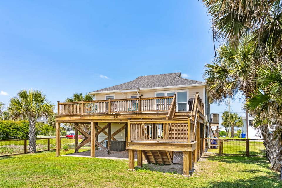 Full back deck leads directly to the fenced in yard.