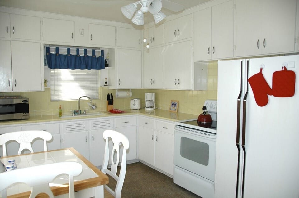 Large kitchen with table that opens up twice as big.