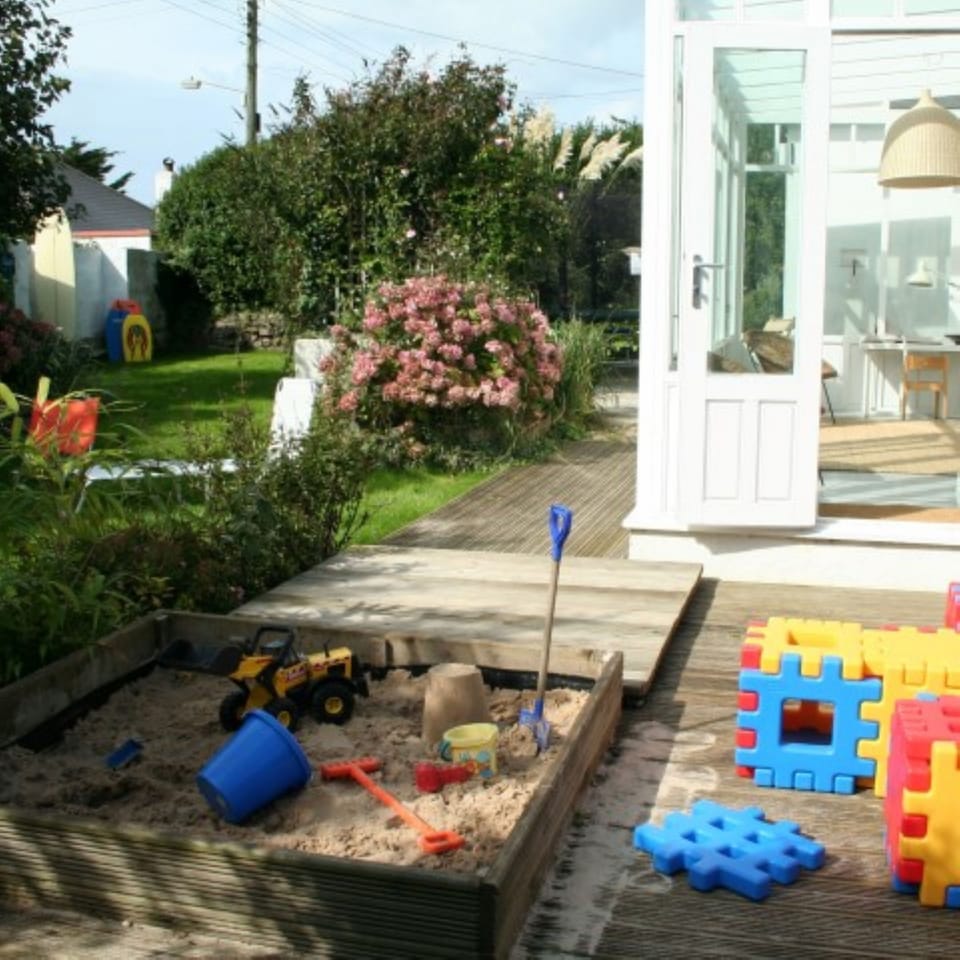 Secluded gardens - n.b: decking now chippings and smaller sandpit
