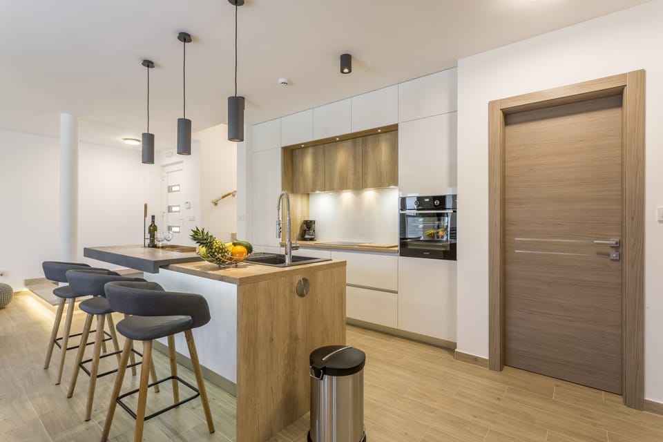 Kitchen bar with dining area.