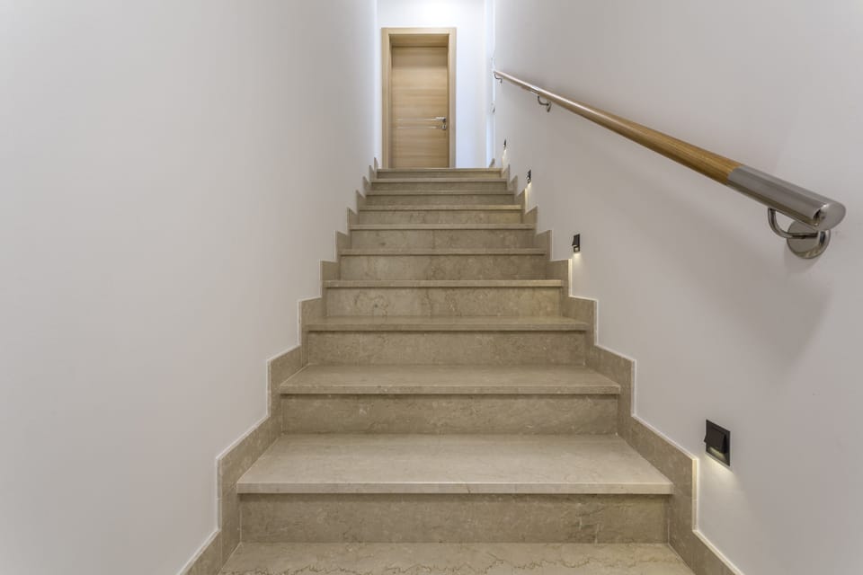 Stairs for the first floor with rooms.