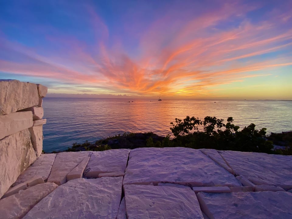 Outdoor ocean shower master bedroom. Villa faces west amazing sunset.